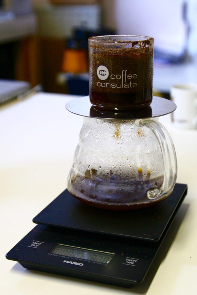 Let the coffee drain into the decanter or cup